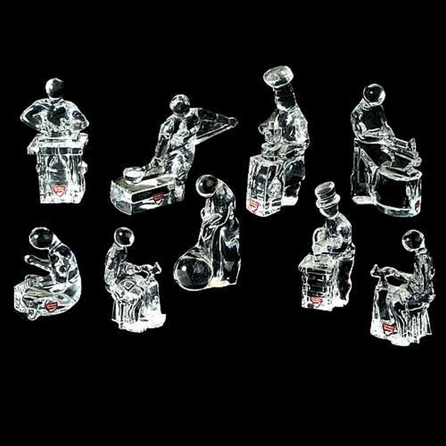 Set of nine Orrefors clear glass figures, 'Craftsmen Series