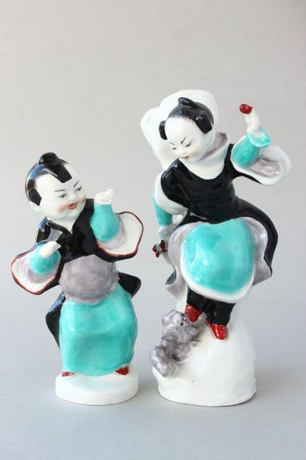 Two Royal Worcester porcelain figures, depicting two Chinese 