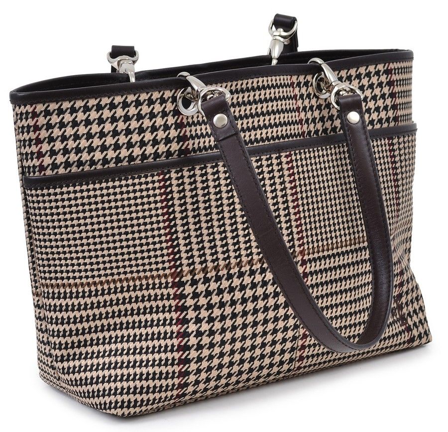 A handbag by Ralph Lauren, styled in tartan fabric with brown ...