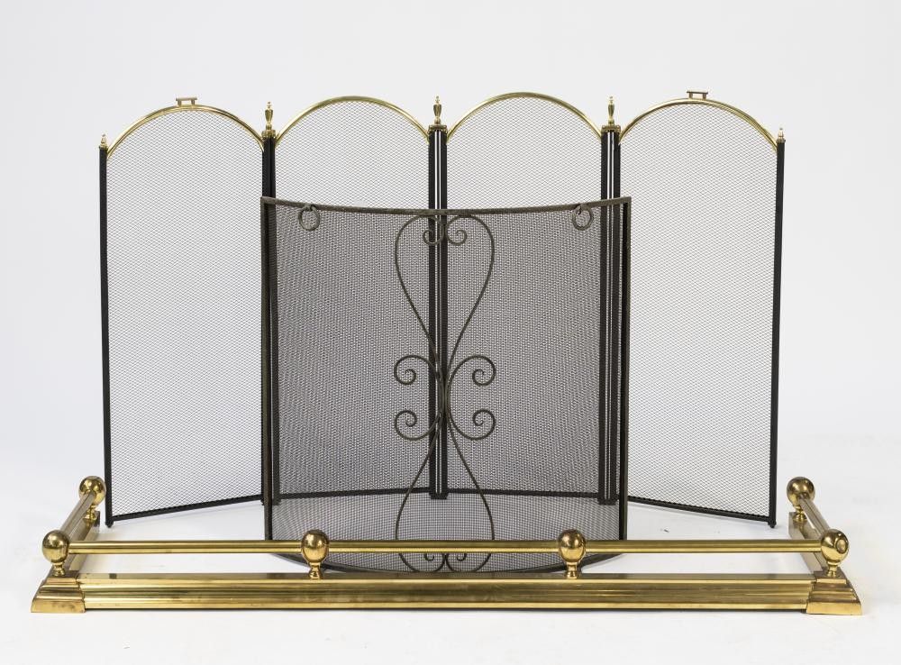 A fixed brass fire fender and two fire screens, the fender with… Zunknown Zunknown