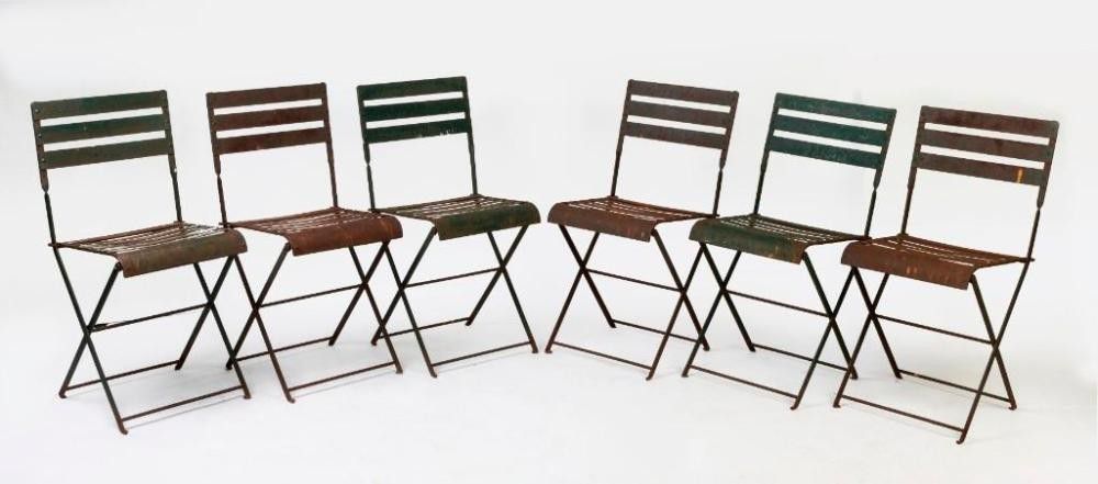 A set of six green painted wrought iron garden chairs - Decorative