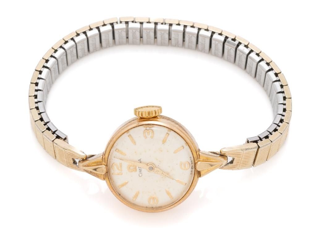 A vintage 9ct gold ladies Omega watch; ref. 2859 with champagne ...
