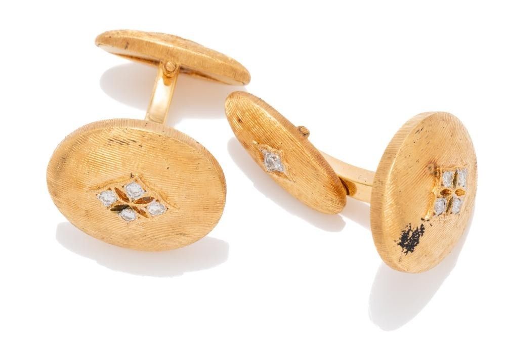 A pair of 18ct gold diamond cufflinks, each an oval brushed ...