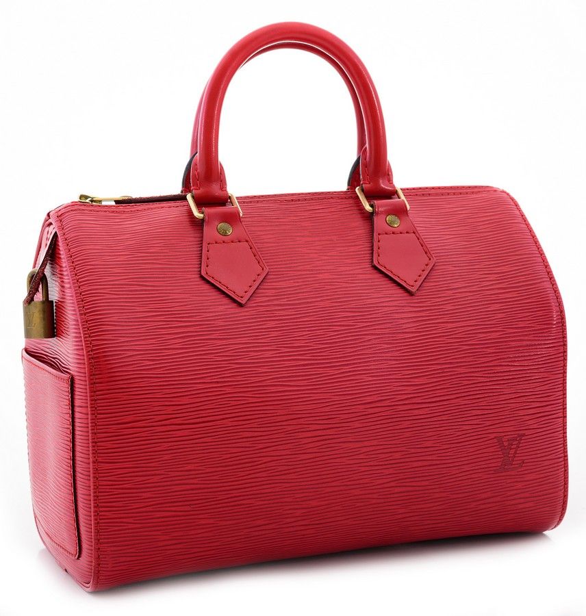 A Speedy handbag by Louis Vuitton, styled in red Epi leather ...