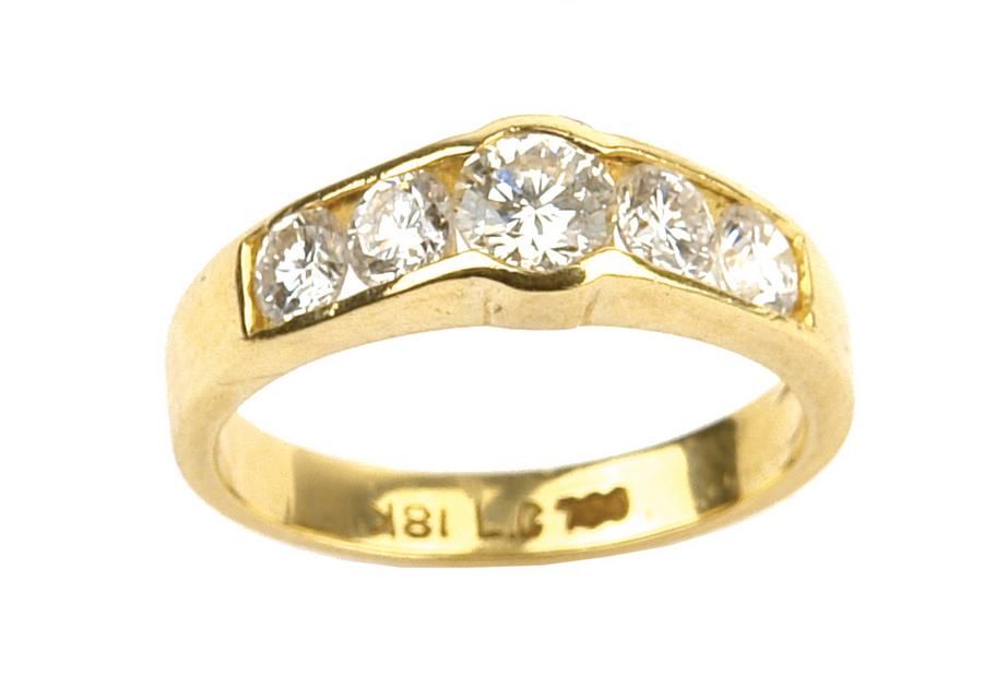 An 18ct. gold and diamond ring, the 0.38ct. modern round… - Rings ...