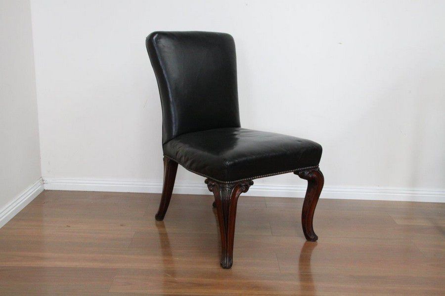 A cabriole leg Irish George III leather upholstered chair. - Seating