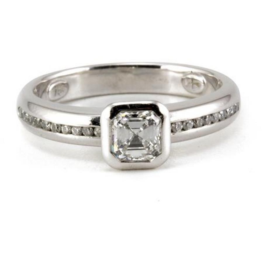 An 18ct white gold diamond ring, centring a square emerald cut… - Rings ...