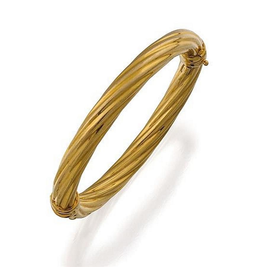 18ct gold bangle, the oval hinged hollow 8.00 mm bangle of… - Bracelets ...