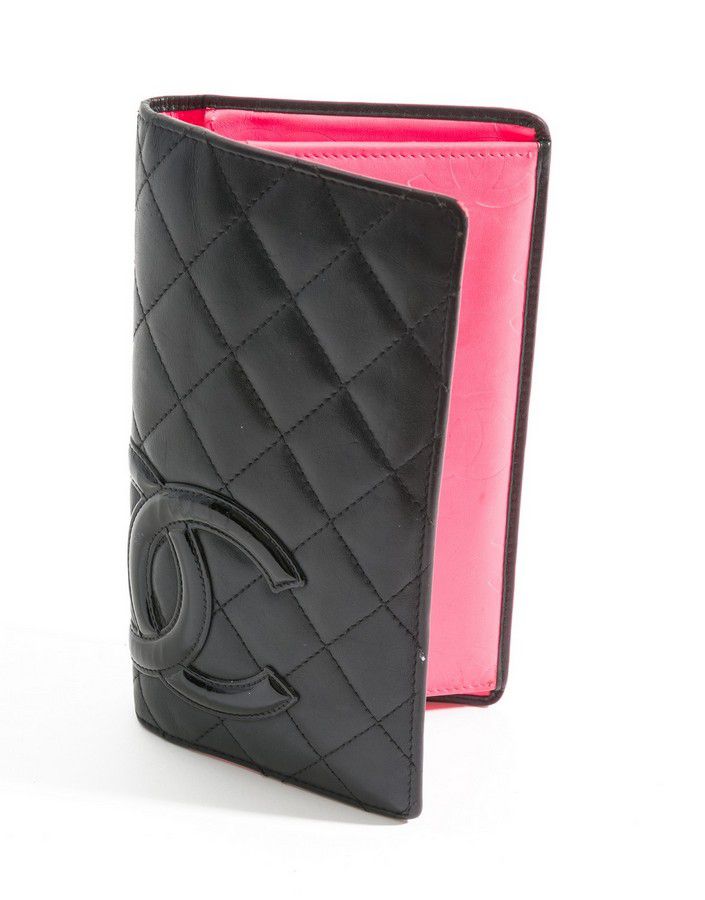 A Cambon long wallet by Chanel, styled in black and pink calf