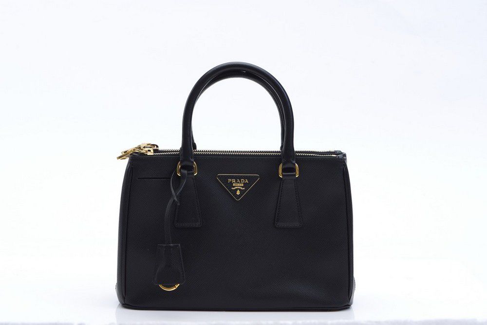 An executive mini tote bag by Prada, styled in black Saffiano… - Handbags &  Purses - Costume & Dressing Accessories
