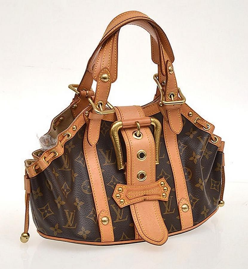 A Theda GM handbag by Louis Vuitton, styled in monogram canvas… - Handbags & Purses - Costume ...