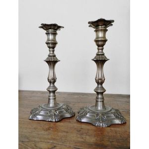 A pair of Sheffield plate candlesticks in the George III style,…