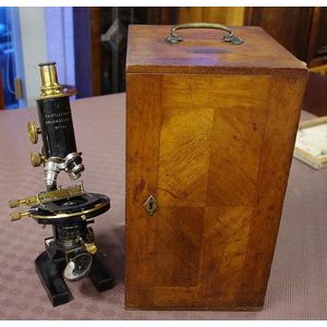 Vintage microscope with fitted case body marked 'Voigtlaender…