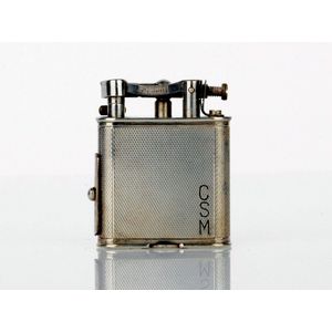 Alfred Dunhill life arm silver pipe lighter, engine turned…