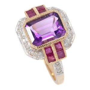A late Art Deco style amethyst ruby and diamond ring, set in…