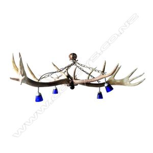 A large four-way deer antler chandelier, with twenty-five…