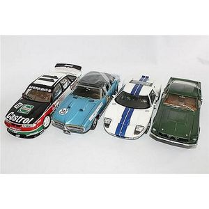 Four various sports vehicles, including Classic Carlectibles…