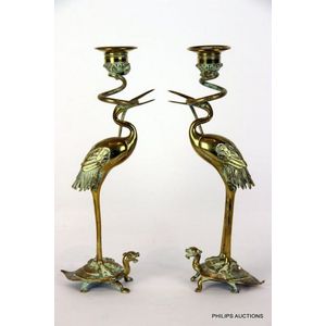 A pair of bronze candlesticks, late 19th century a pair of gilt…