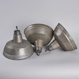 A set of three Industrial lamp shades. Height 32 cm, width 39 cm