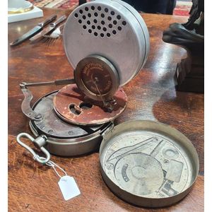 A Mikiphone portable pocket phonograph, made by Paillard…
