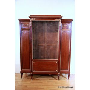 An elegant Louis XVI style mahogany breakfront bookcase, circa&hellip;