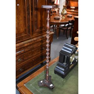 A Victorian mahogany wig stand with turned column support