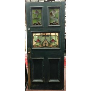 An Arts & craft timber door inset with stained glass windows, c.…