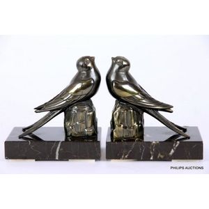 A pair of Art Deco spelter bird bookends, circa 1930, the…