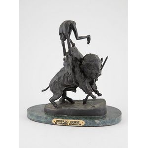 Buffalo horse bronze after Frederic Remington, on oval green…
