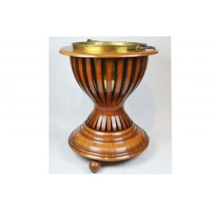 A timber 19th century wine cooler upon bun feet having inlaid&hellip;