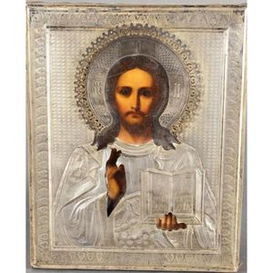 Russian icon and silver oklad, of rectangular form depicting…