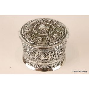 A Burmese silver betel nut box, circa 1900, the fine…