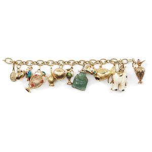 A gold and gem set charm bracelet, the fancy link bracelet in&hellip;