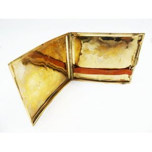 An early 20th century Cigarrette case, a smaller 9ct yellow…