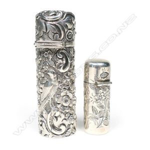 Two Victorian silver cased perfume bottles, one profusely&hellip;