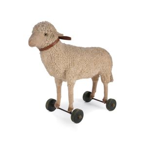 Steiff pull along sheep, c.1920. Tufted white mohair sheep on…