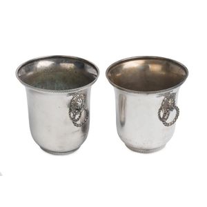 A pair of silver plated wine coolers with lion mask ring…
