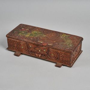 An impressive Jane Brenkley carved box. The lid features an…