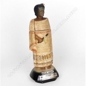 A Jim Beam 'Hone Heke' decanter, with music box base, height 34.…