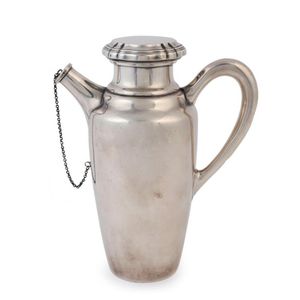 An American silver cocktail shaker, circa 1920, stamped…