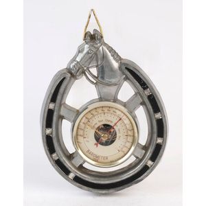 A vintage Japanese wall barometer in horseshoe frame, mid 20th…