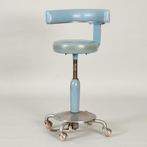 A 1970's Dentist swivel stool, Industrial chromed steel base…