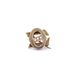 Antique rose gold lapel pin of Omega Sigma form set with split…