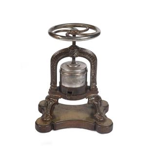 A French bronze and silver metal wine press, late 19th/early…