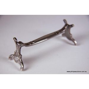 A set of nine Art Nouveau Christofle silver plated knife rests,…