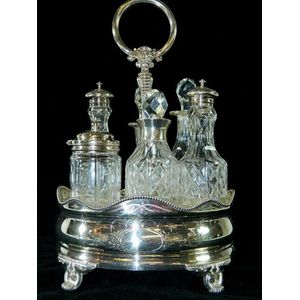 A Victorian silver-plated six bottle cruet set