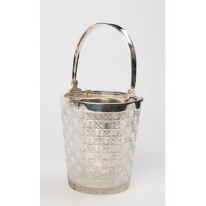 A faceted crystal and silver plated wine cooler with internal…