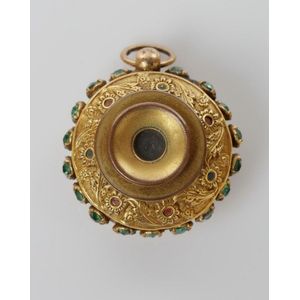 A gilt metal and green-paste stone set opera-glass pendant.&hellip;