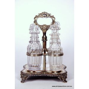 A Sheffield plate four bottle cruet set, 19th century, the…