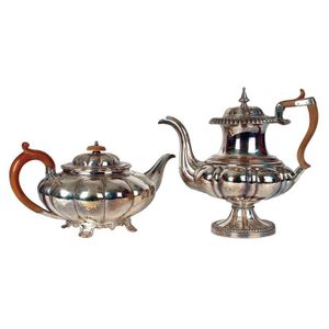 A Sheffield Plate coffee pot and teapot, of similar style, both…